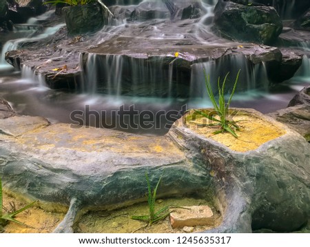 Beautiful small waterfall with a long exposure picture taken
