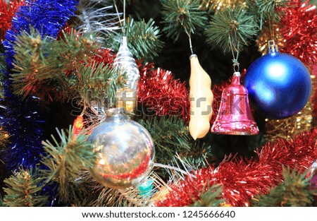toys on green christmas fir