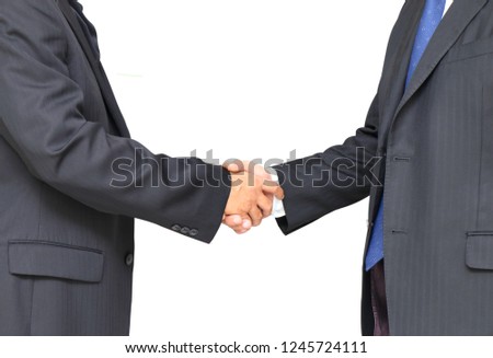 closeup image of two businessman handshake for business