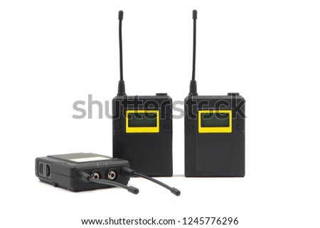 Three wireless microphone transmitter and reciever  isolated on white background    