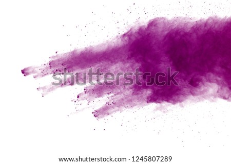 Abstract violet powder splatted background,Freeze motion of color powder exploding/throwing color powder,color glitter texture on white background.