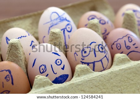 Image of various face painted eggs.