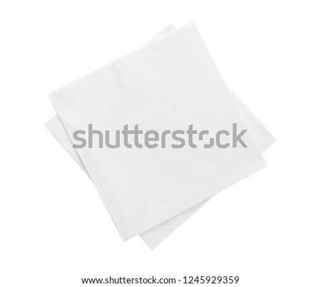 Clean paper napkins on white background, top view Royalty-Free Stock Photo #1245929359