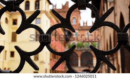 Old cast iron fence on the street in Verona