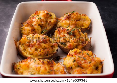 baked potato with cheese and bacon Royalty-Free Stock Photo #1246039348