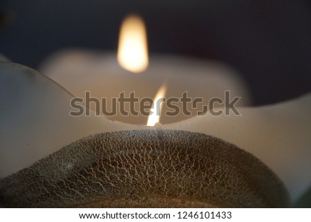 Christmas Candles. Light In Darkness. Beautiful Dark Background With Flame Light.