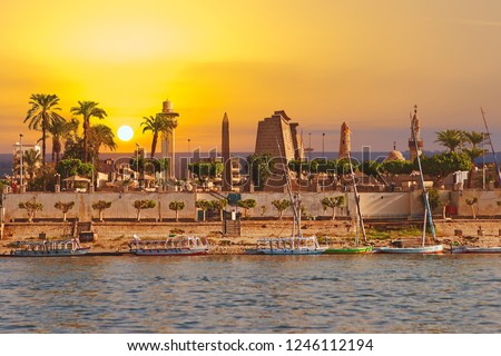 River Nile Luxor Egypt, Beautiful yellow sunny background Royalty-Free Stock Photo #1246112194