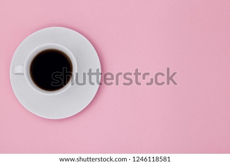 Top view image of coffe cup on pink paper background. Copy space for input the text. Flat lay. 