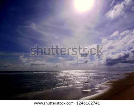 sunset on the coast of the beach bay of the city of Cadiz, Andalusia. Spain. Europe