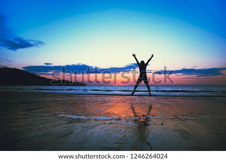 Asian man fun jumping and happy with beach tourism. Travel relax summer