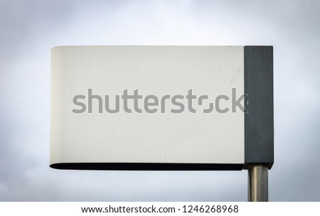 White Street Sign Advertisement Mockup. Copy Space. Iron Pole. Cloudy Background.