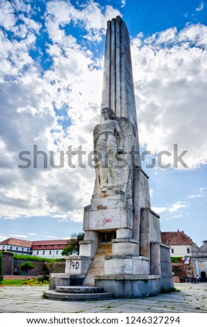 Horea, Closca and Crisan Obelisk at Alba Iulia on a bright sunny day with clouds, Romania
