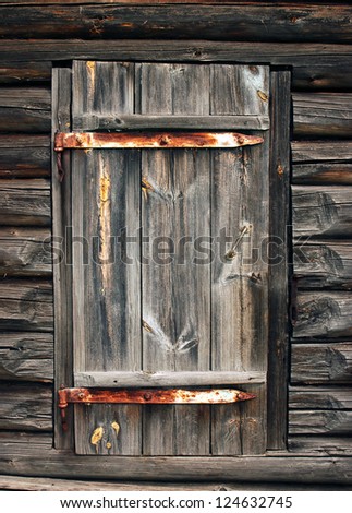 Old wooden barn door in the Russian village