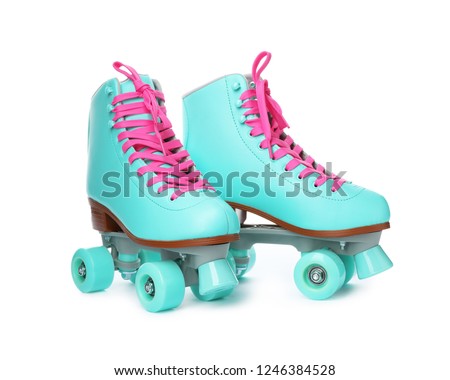 Pair of bright stylish roller skates on white background Royalty-Free Stock Photo #1246384528