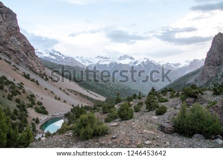 Lake in high and snowy Fann mountains, Tajikistan.