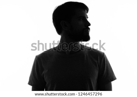 black silhouette of a man on a light background                         