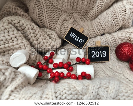 hello 2019 flatlay on knitted background