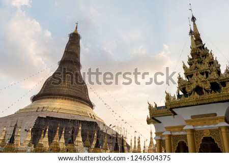 Wide angle picture of beautiful golden hwedagon Pagoda, important landmark of Yangon, Myanmar