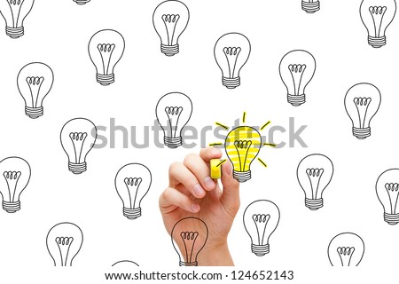 So many ideas, but only a few are great. One glowing light bulb among many. Royalty-Free Stock Photo #124652143