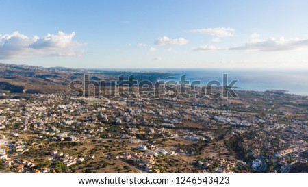 Beautiful photo above Paphos, Cyprus, taken from upper Peyia region, known as Pegeia, city, hills and sea 