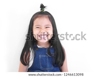 Asian child cute or kid girl and kindergarten student happy smile white teeth and laugh thinking for new idea with wear dungarees jean at dental or pre school on white background with space isolated Royalty-Free Stock Photo #1246613098