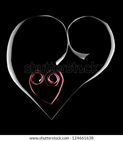 Red and white love paper hearts on black background