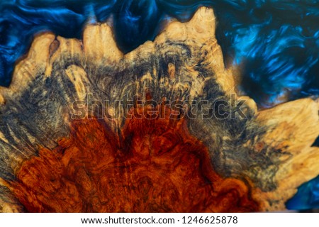 epoxy resin Stabilizing Afzelia burl exotic wood blue sky background texture, Abstract art picture photo, print design and your advertisement