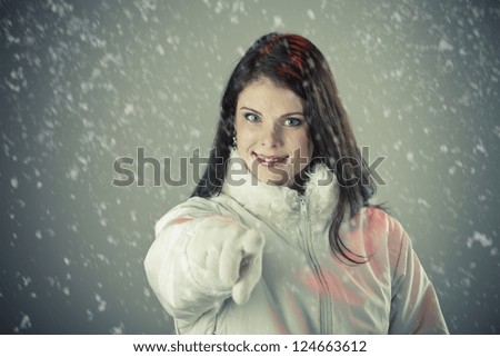 Winter portrait of a young beautiful woman. Toned image.