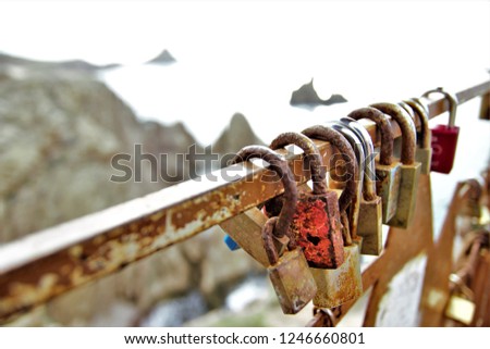Locks of love in the natural park of Cabo de Gata, the viewpoint of the lighthouse of Cabo de Gata, Natural Park, Almería, Andalusia, Spain, behind the reefs of the Sirens,