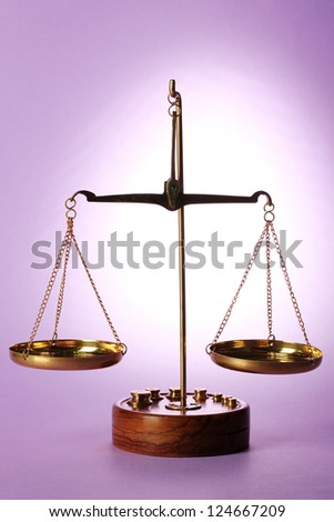 Classic scales on purple background
