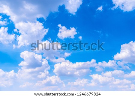 Beautiful white clouds with blue sky.Color shade gradient from white to blue using for fresh background wallpaper.