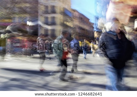 ghostly figures of tourists in Toledo, Spain, tribute to Monet, photographic sweep, sensation of movement, blurred people, impressionist photography, abstract, atmosphere, tourism, advertising