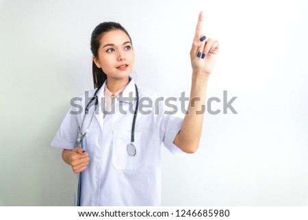 Women Doctor hand pointing on empty space, soft focus - can be used for montage your texts or pictures
