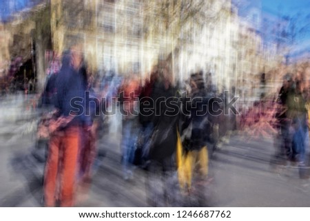 ghostly figures of tourists in Toledo, Spain, photographic sweep, sensation of movement, blurred people, impressionist photography, abstract, atmosphere, tourism, tourist, advertising, travel, 