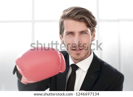 Businessman standing posture with boxing gloves