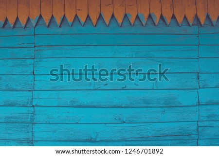 Blue background from old, faded boards. Wooden wall of a country house, handmade, carpentry craft. Retro style, without pattern. Horizontal stripe, vintage toning.