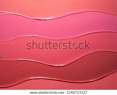 Red pink orange lipstick background texture smudged Royalty-Free Stock Photo #1246713127