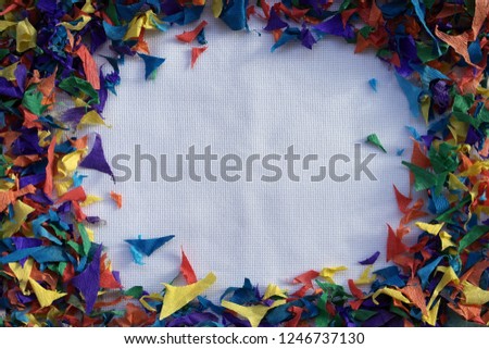 Multicolored pieces of paper on a white background. For your text or congratulations.