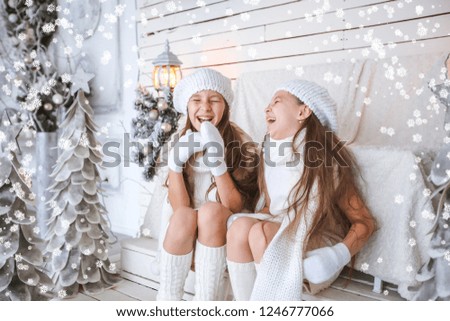 Happy kids  smiling over christmas background