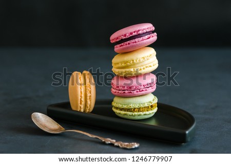 Colorful macarons cakes. Small French cakes. Sweet and colorful french macaroons. Royalty-Free Stock Photo #1246779907