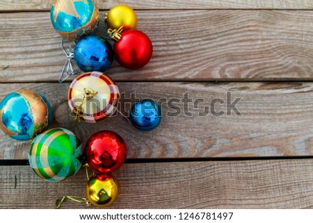 Christmas baubles on wooden background. Top view, copy space