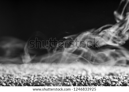 Isolated white nature smoke overlay effect on solid super black background on gray rock cement concrete floor with smoky fog mist in creepy horror graveyard mystery scary concept theme in dark forest