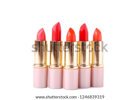 Red lipsticks isolated on white background. Cosmetic