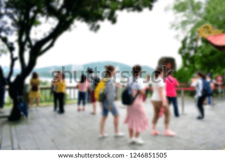 Blurred for background of tourist walking on the sidewalk and enjoy taking a photo at the viewpoint, this place is one of the famous tourist destination in Nantou, Taiwan. Travel lifestyle concept.