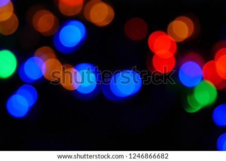 Blurry unfocus lights small dot in dark background