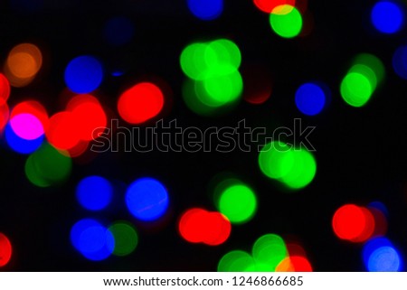 Blurry unfocus lights small dot in dark background