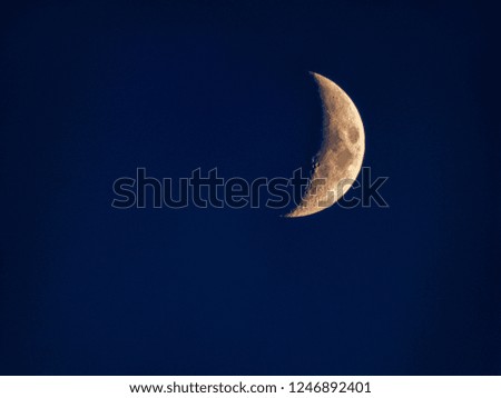 half moon on dark blue sky, quarter moon, crater, 