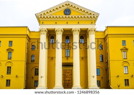 Minsk Yellow Colored Belarus KGB Headquarter with White Sky Background
