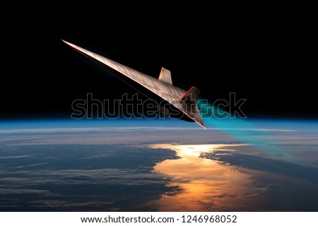 The leading edges of an unmanned scramjet glow from friction as it flys toward outer space near the edge of Earth's atmosphere. - Elements of this image courtesy of NASA Royalty-Free Stock Photo #1246968052