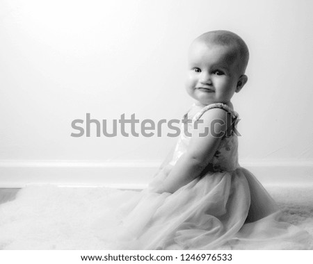 Baby girl portrait in ballerina dress